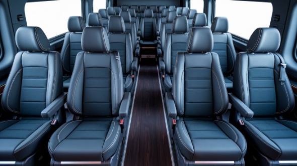 san marcos sprinter van with driver inside